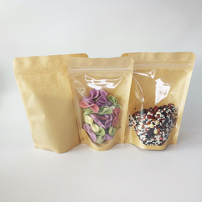 Αγορά Προσαρμοσμένο Gravure Printed Front Clear Stand Up Kraft Paper Bag Ενυδατοασφαλής για συσκευασίες τροφίμων online manufacture
